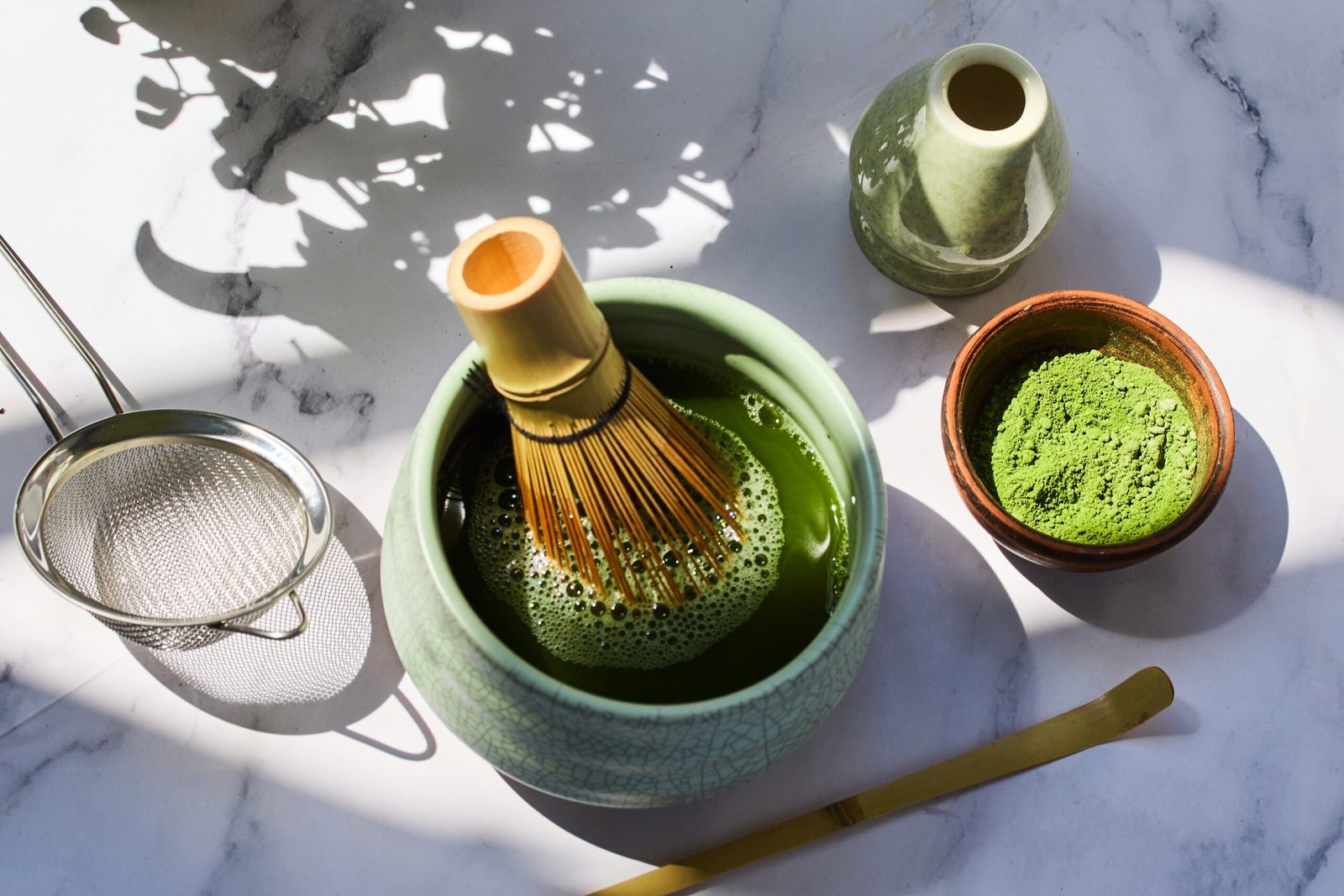 Traditional,Matcha,Preparation.,Elegant,Matcha,Tea,Setup,With,A,Whisk,
