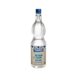 Tall glass bottle of Zucchero Italiano Plus sugar syrup with blue cap on a white background .