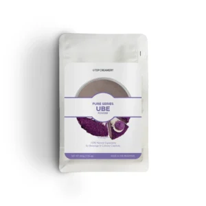 White stand-up pouch labeled Top Creamery Pure Series UBE Powder, 200 g, white and purple design with product image at bottom.