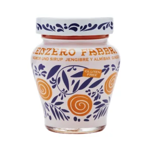 Close-up of a white bottle with blue floral pattern and an orange 'GLUTEN FREE' label visible on the body.