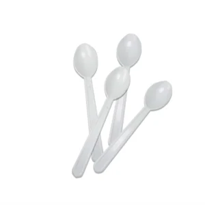Four white plastic disposable spoons arranged in a fan shape.