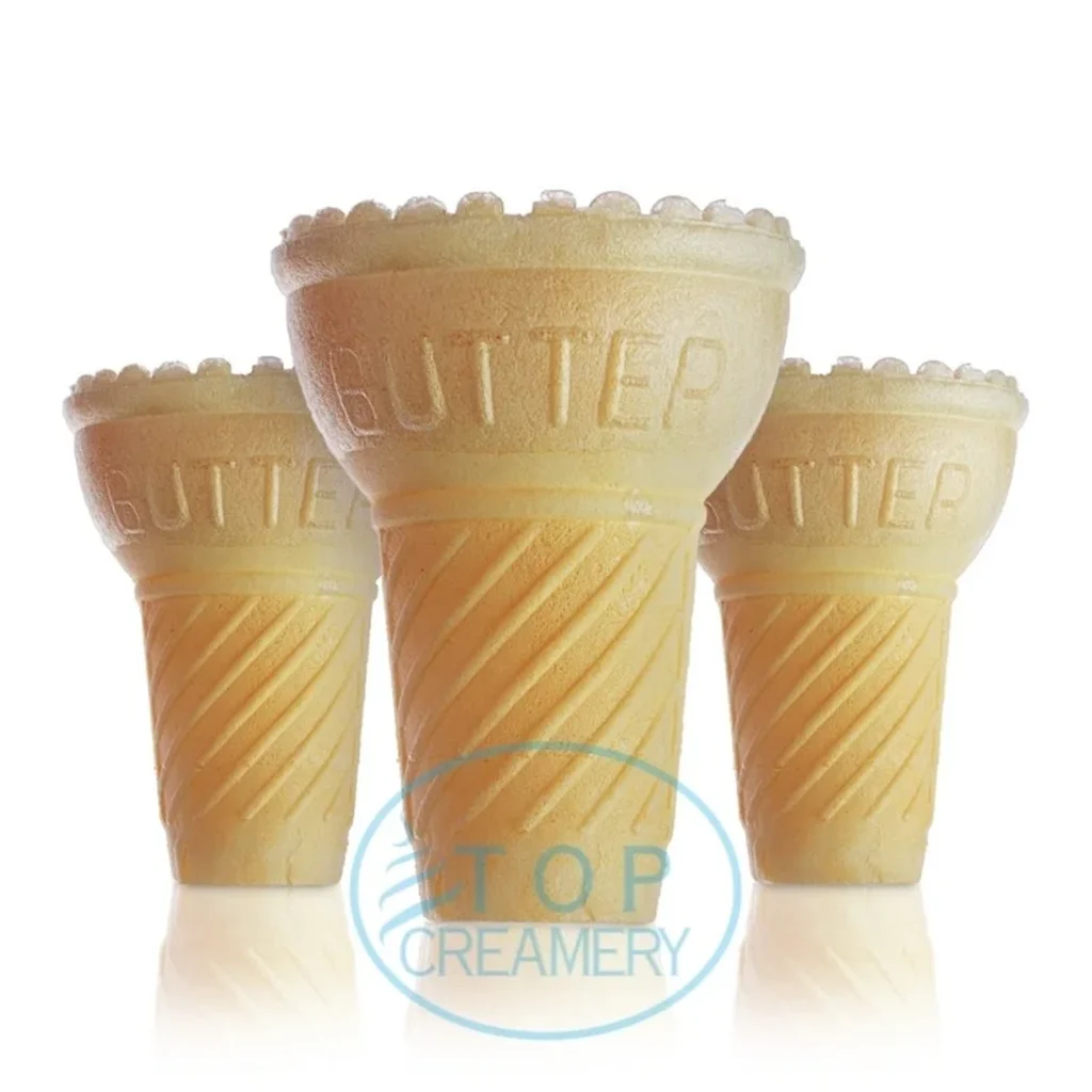 Three vanilla ice cream cones arranged side by side with waffle cups.