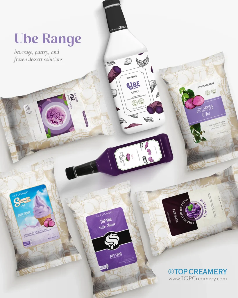 A collection of Top Creamery Ube product packaging scattered on a white surface, featuring purple accents and a bottle in the center with the brand logo visible.